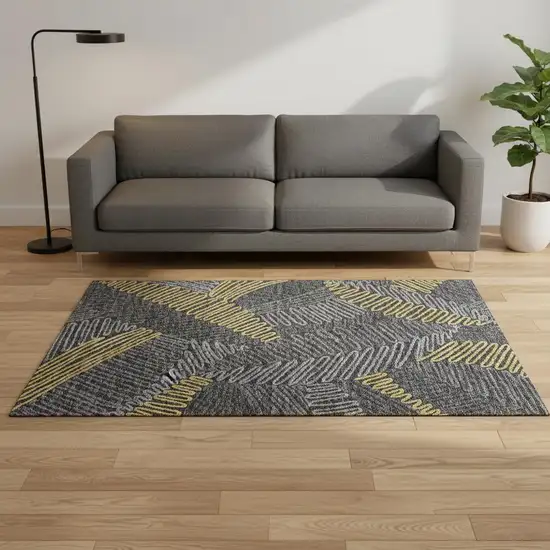 Gray Gold And Black Botanical Leaves Washable Area Rug With UV Protection Photo 1