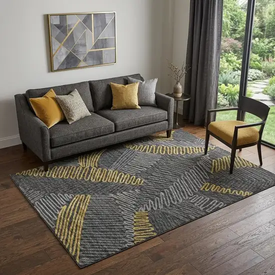 Gray Gold And Black Botanical Leaves Washable Area Rug With UV Protection Photo 1