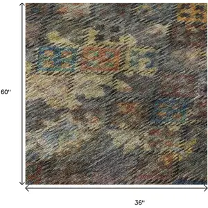 Photo of Gray Gold And Coral Abstract Geometric Washable Area Rug With UV Protection