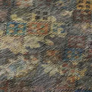 Photo of Gray Gold And Coral Abstract Geometric Washable Area Rug With UV Protection