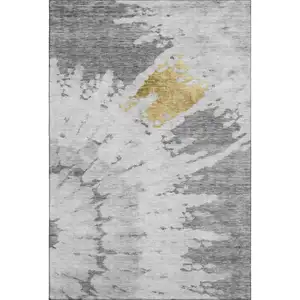 Photo of Gray Gold And Ivory Abstract Washable Area Rug With UV Protection