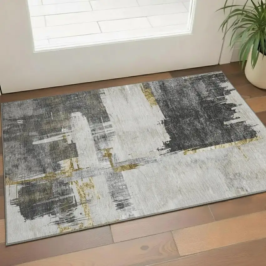 Gray Gold And Ivory Abstract Washable Area Rug With UV Protection Photo 1