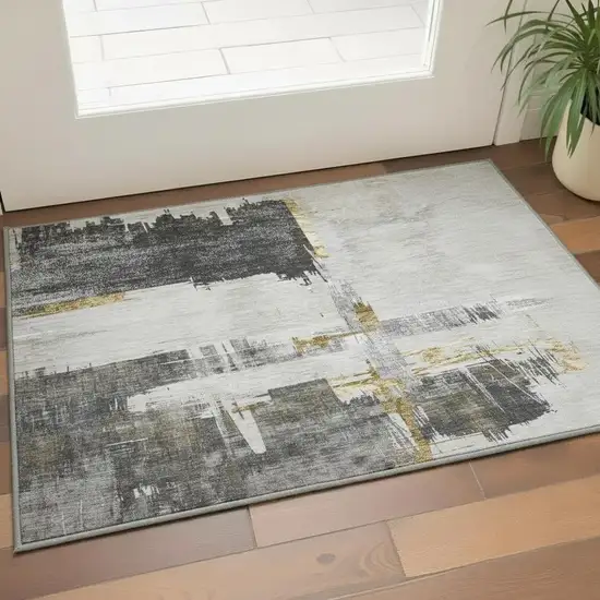 Gray Gold And Ivory Abstract Washable Area Rug With UV Protection Photo 2
