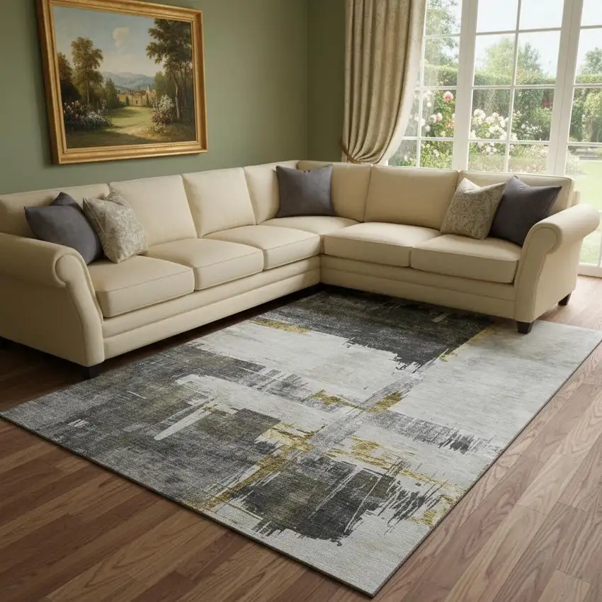 Gray Gold And Ivory Abstract Washable Area Rug With UV Protection Photo 1