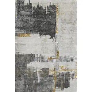 Photo of Gray Gold And Ivory Abstract Washable Area Rug With UV Protection