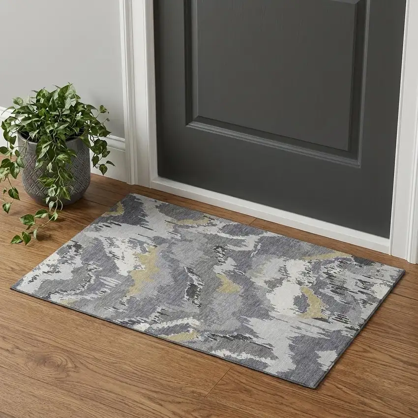 Gray Gold And Ivory Abstract Washable Area Rug With UV Protection Photo 1