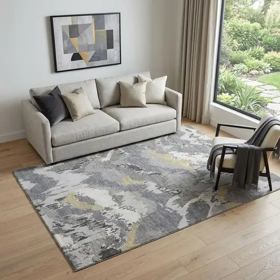 Gray Gold And Ivory Abstract Washable Area Rug With UV Protection Photo 1