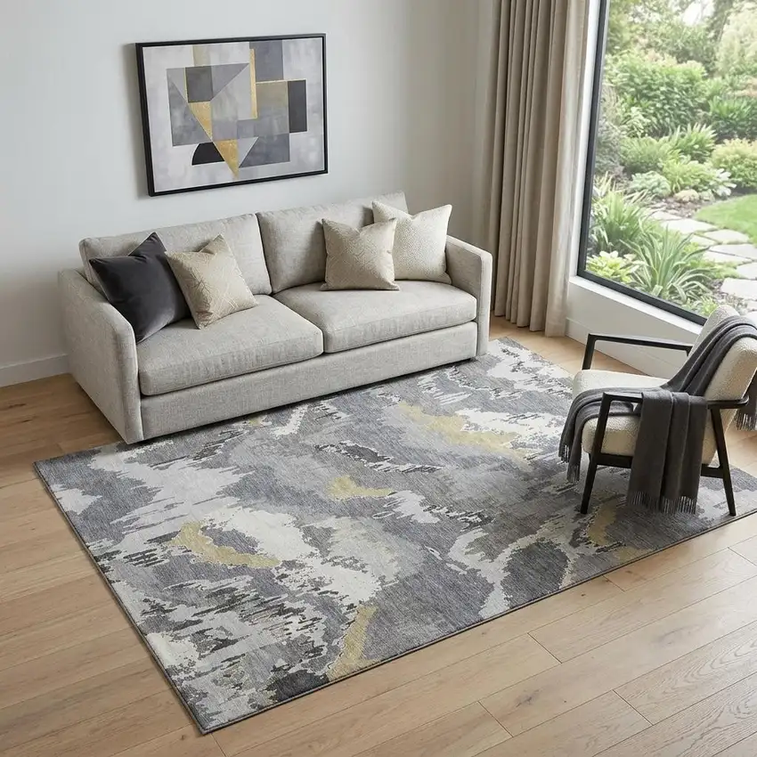 Gray Gold And Ivory Abstract Washable Area Rug With UV Protection Photo 1