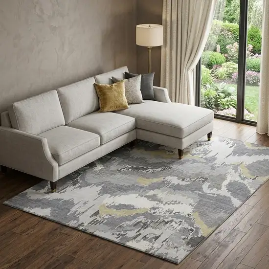 Gray Gold And Ivory Abstract Washable Area Rug With UV Protection Photo 1