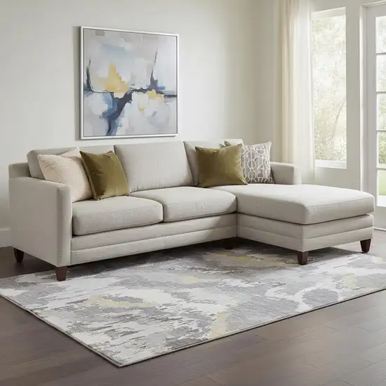 Gray Gold And Ivory Abstract Washable Area Rug With UV Protection Photo 1