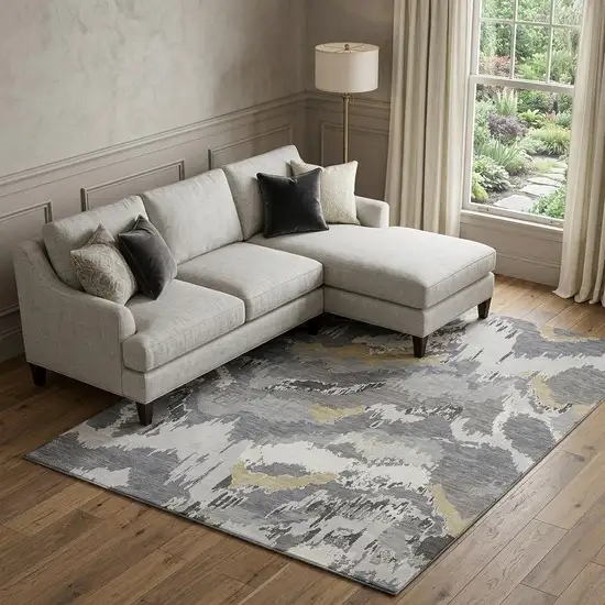 Gray Gold And Ivory Abstract Washable Area Rug With UV Protection Photo 1