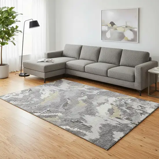 Gray Gold And Ivory Abstract Washable Area Rug With UV Protection Photo 1