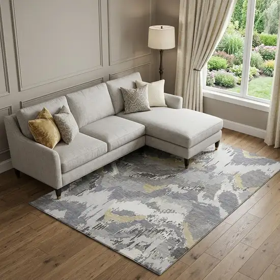 Gray Gold And Ivory Abstract Washable Area Rug With UV Protection Photo 1