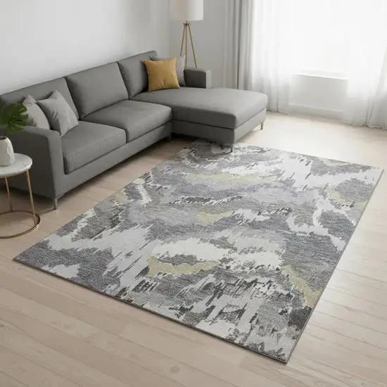 Gray Gold And Ivory Abstract Washable Area Rug With UV Protection Photo 1