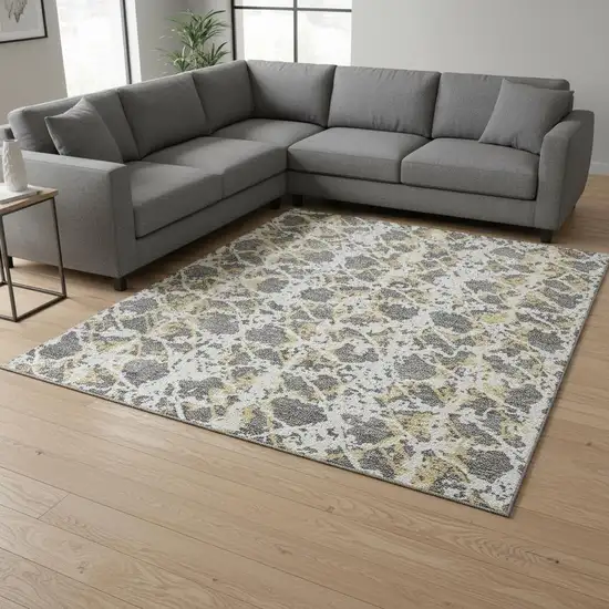 Gray Gold And Ivory Abstract Washable Area Rug With UV Protection Photo 2