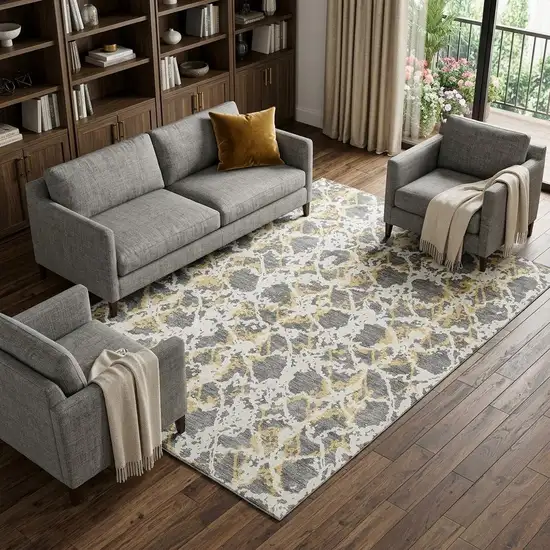 Gray Gold And Ivory Abstract Washable Area Rug With UV Protection Photo 1
