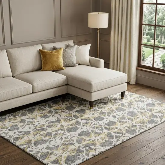 Gray Gold And Ivory Abstract Washable Area Rug With UV Protection Photo 1