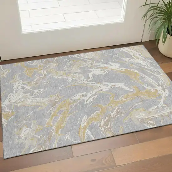 Gray Gold And Ivory Abstract Washable Area Rug With UV Protection Photo 1