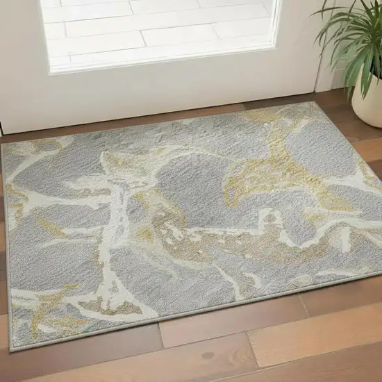 Gray Gold And Ivory Abstract Washable Area Rug With UV Protection Photo 2