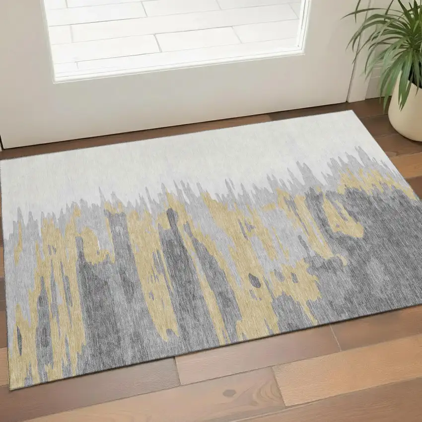 Gray Gold And Ivory Abstract Washable Area Rug With UV Protection Photo 1