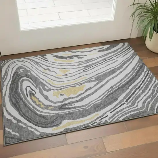 Gray Gold And Ivory Abstract Washable Area Rug With UV Protection Photo 2