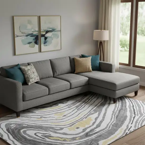 Gray Gold And Ivory Abstract Washable Area Rug With UV Protection Photo 2