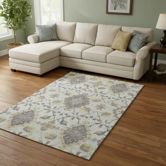 Gray Gold And Ivory Oriental Washable Area Rug With UV Protection Photo 2