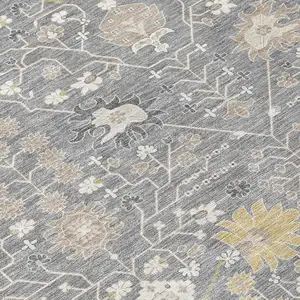 Photo of Gray Gold And Ivory Oriental Washable Indoor Outdoor Area Rug