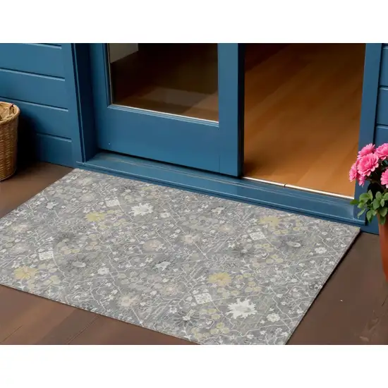 Gray Gold And Ivory Oriental Washable Indoor Outdoor Area Rug Photo 1