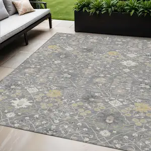 Photo of Gray Gold And Ivory Oriental Washable Indoor Outdoor Area Rug