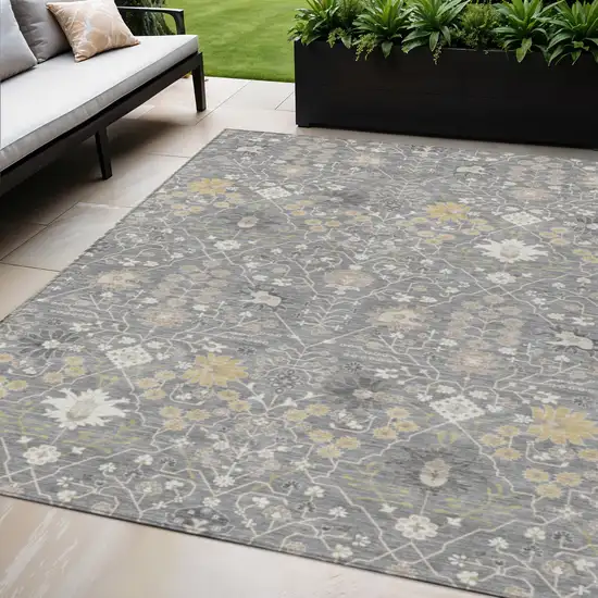 Gray Gold And Ivory Oriental Washable Indoor Outdoor Area Rug Photo 1