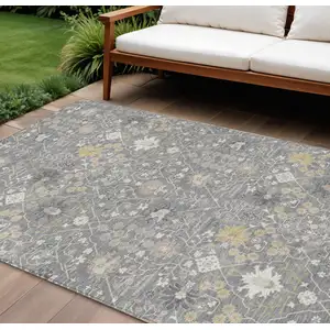 Photo of Gray Gold And Ivory Oriental Washable Indoor Outdoor Area Rug