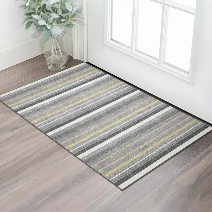 Gray Gold And Ivory Striped Washable Area Rug With UV Protection Photo 1
