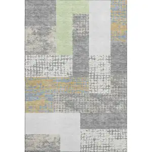 Photo of Gray Gold And Mint Green Geometric Washable Area Rug With UV Protection