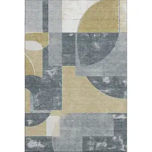 Photo of Gray Gold And Silver Abstract Geometric Washable Area Rug With UV Protection