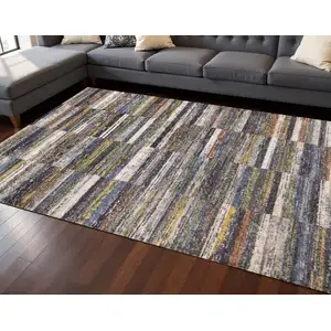 Photo of Gray Green And Ivory Abstract Area Rug