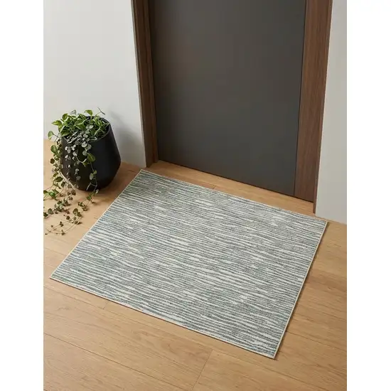 Gray Green And Ivory Striped Distressed Stain Resistant Area Rug Photo 1