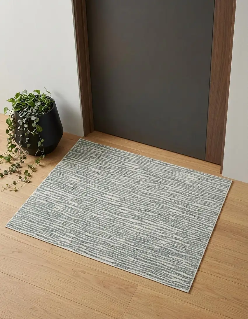 Gray Green And Ivory Striped Distressed Stain Resistant Area Rug Photo 1