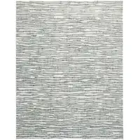 Photo of Gray Green And Ivory Striped Distressed Stain Resistant Area Rug
