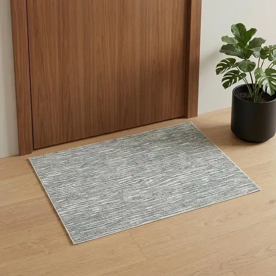 Gray Green And Ivory Striped Distressed Stain Resistant Area Rug Photo 1