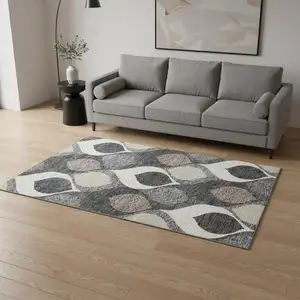 Photo of Gray Ivory And Beige Ogee Washable Area Rug With UV Protection