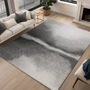 Photo of Gray Ivory And Black Abstract Washable Indoor Outdoor Area Rug