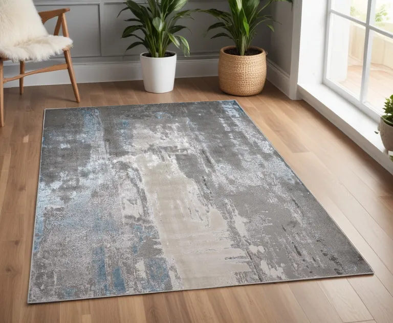 Gray Ivory And Blue Abstract Area Rug Photo 1
