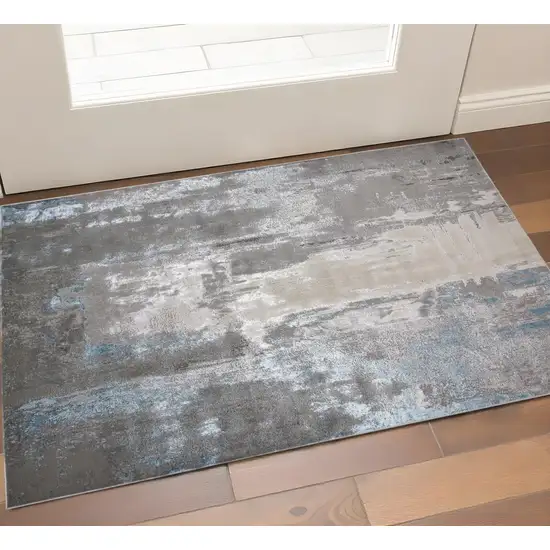 Gray Ivory And Blue Abstract Area Rug Photo 1