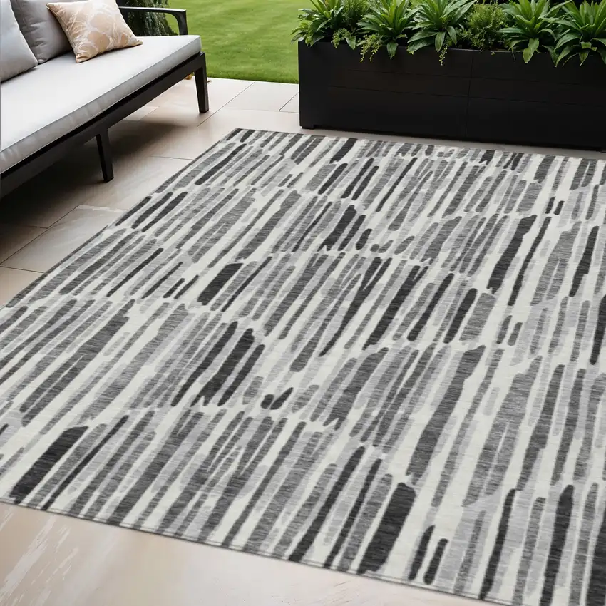 Gray Ivory And Charcoal Abstract Washable Indoor Outdoor Area Rug Photo 1