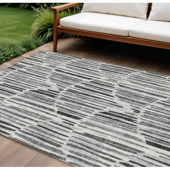 Gray Ivory And Charcoal Abstract Washable Indoor Outdoor Area Rug Photo 1