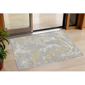 Photo of Gray Ivory And Gold Abstract Washable Indoor Outdoor Area Rug
