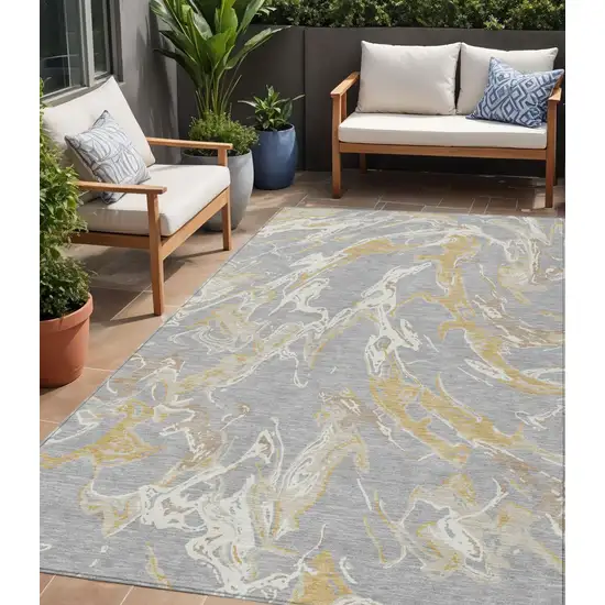 Gray Ivory And Gold Abstract Washable Indoor Outdoor Area Rug Photo 1