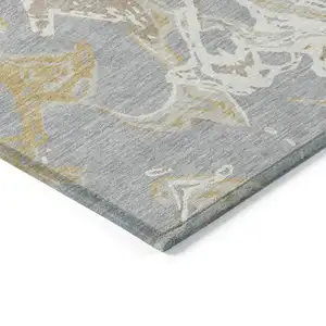 Photo of Gray Ivory And Gold Abstract Washable Indoor Outdoor Area Rug
