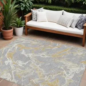 Photo of Gray Ivory And Gold Abstract Washable Indoor Outdoor Area Rug